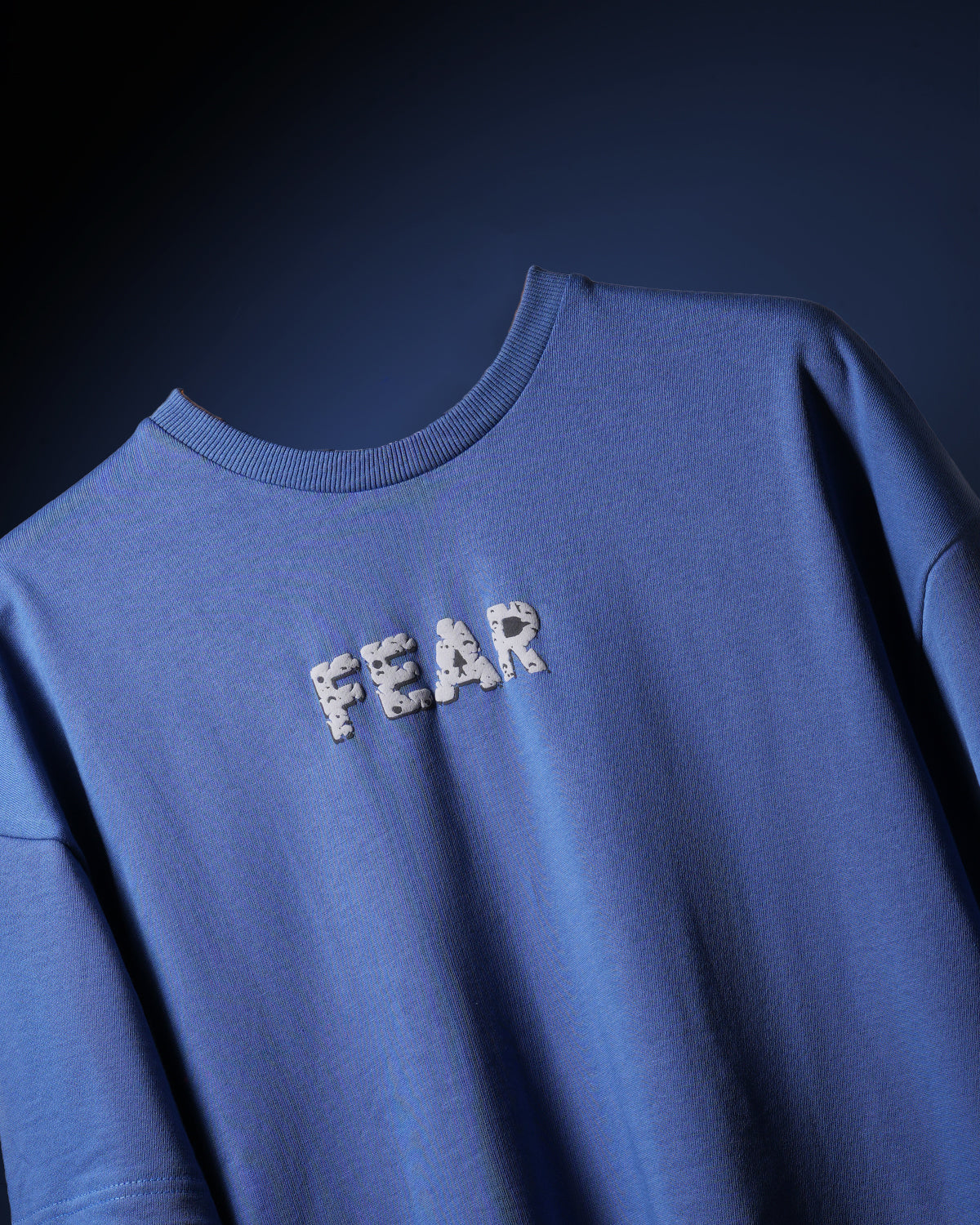 Get the FEAR MOON TEE, an oversized streetwear staple made of premium 260 GSM cotton with a striking puff + screen print moon graphic. Sturdy, fashionable, and designed to be noticed.