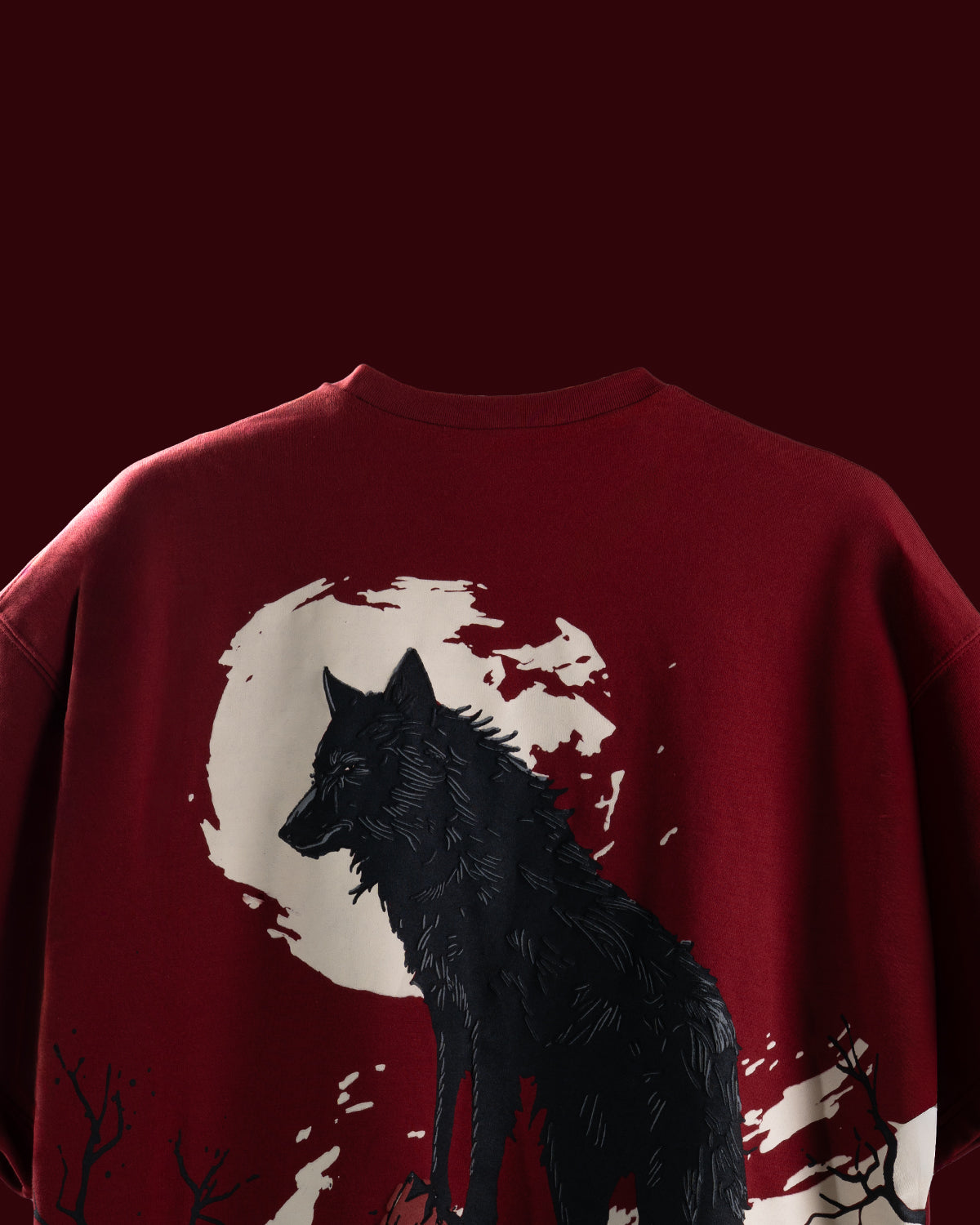 Red t-shirt with a black wolf design 