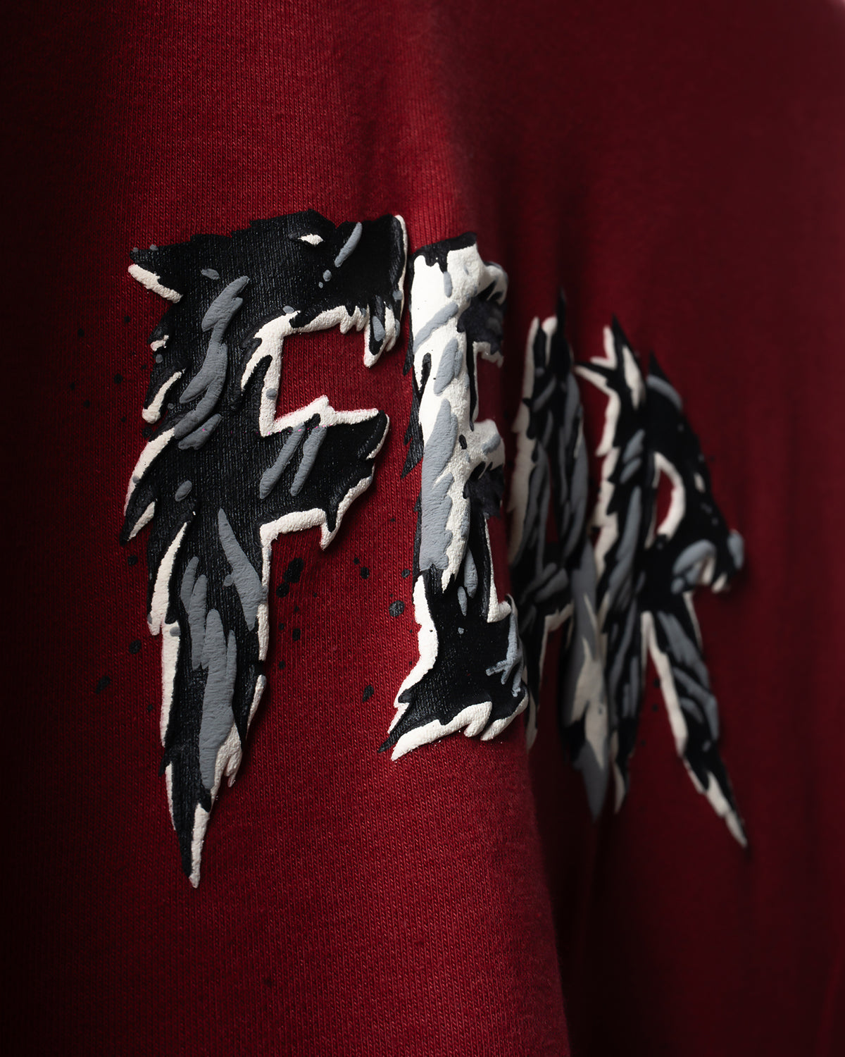 Black and white FEAR text wolf design